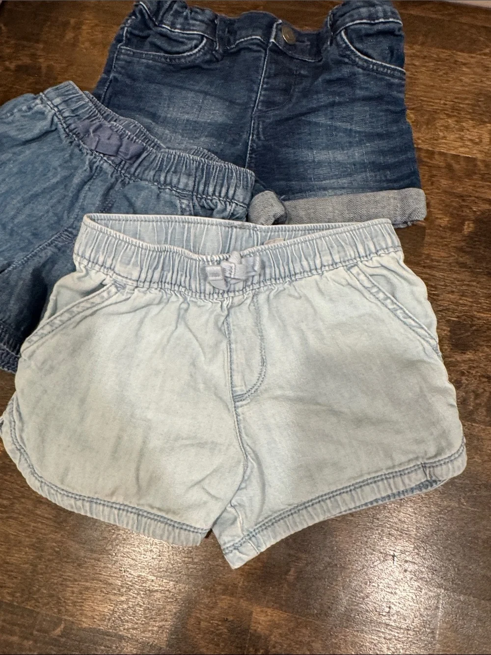 Three pairs of denim shorts 5T